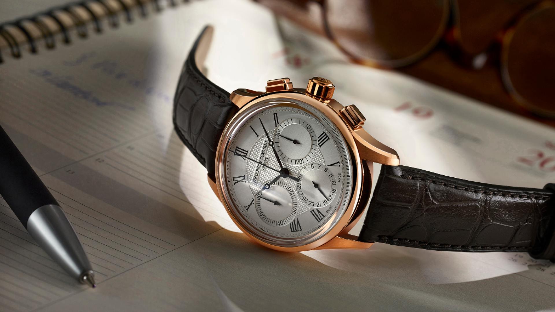 Flyback Chronograph Manufacture watch for man.Automatic movement, brown dial, rose-gold plated case, date, seconds and minutes counters, chronograph and brown leather strap