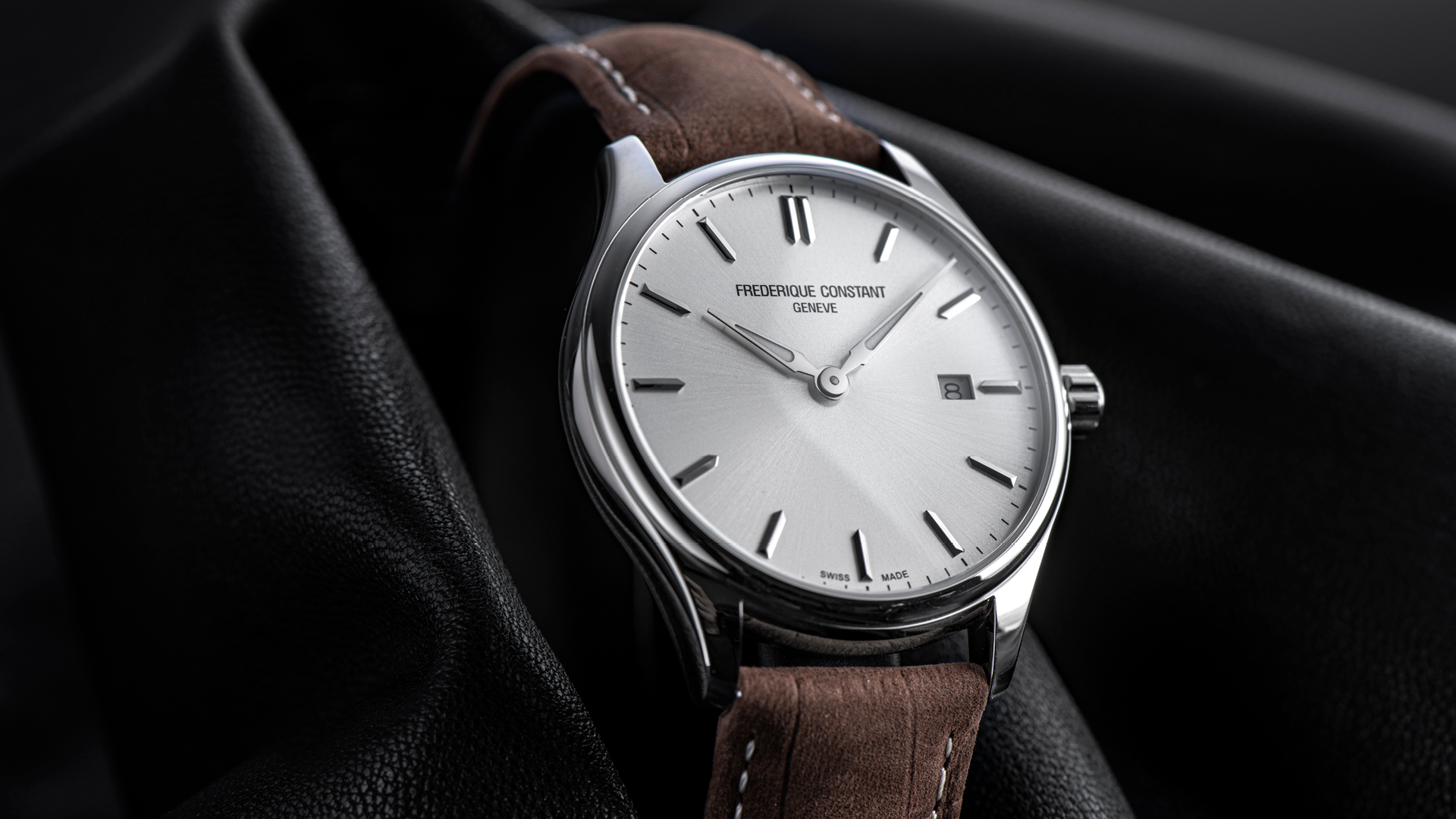 Classic Quartz watch for man. Quartz movement, silver dial, stainless-steel case, date window and brown leather strap