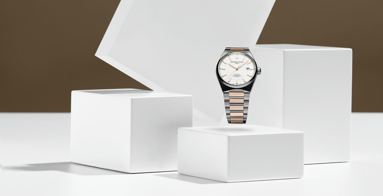 Highlife Automatic COSC watch for man. Automatic movement, white dial, stainless-steel and rose-gold plated case, date window and stainless-steel and rose-gold plated integrated and interchangeable bracelet 