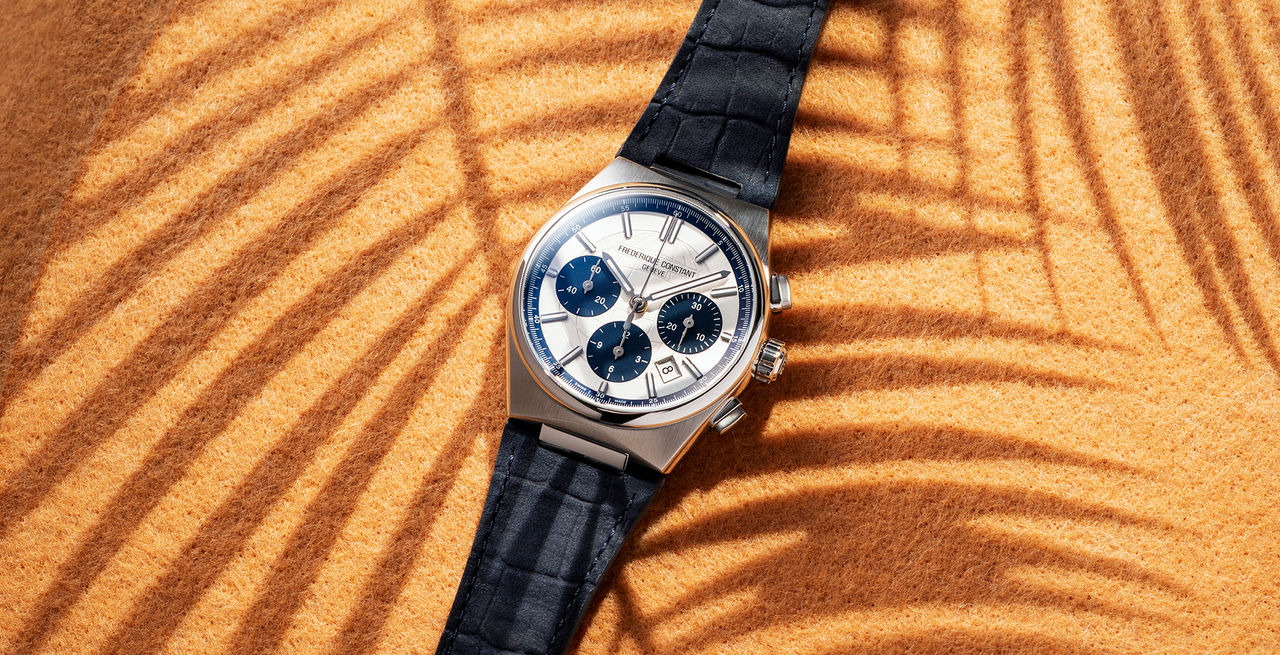 Highlife Chronograph Automatic watch for men. Automatic movement, panda white and blue dial, stainless-steel case, date window, chronograph and blue leather integrated and interchangeable strap 