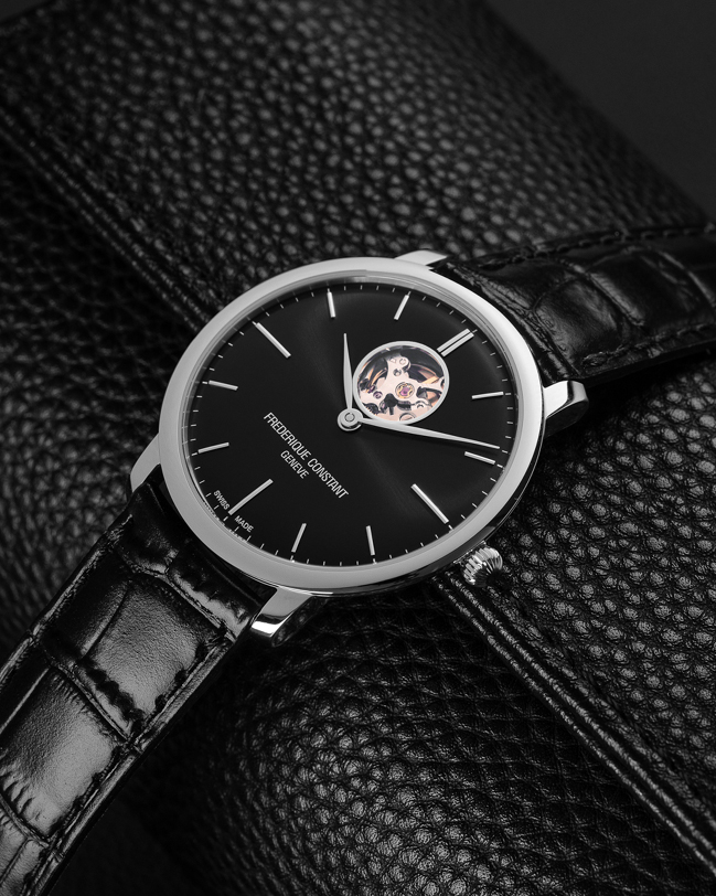 Slimline Heart Beat Automatic watch for man. Automatic movement, black dial, stainless-steel case, heart beat opening and black leather strap 