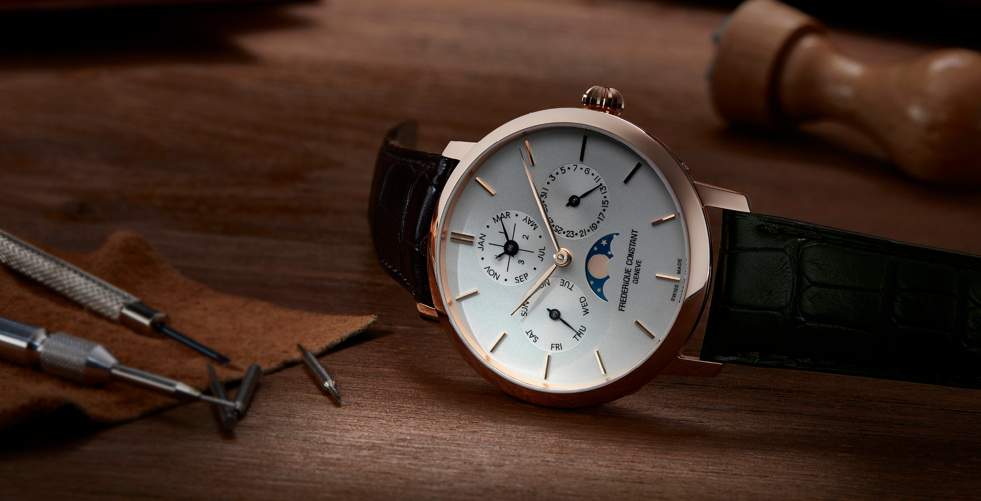 Slimline Perpetual Calendar Manufacture watch for man.   Automatic movement, white dial, rose-gold plated case, date, day and month counters, moonphase and brown leather strap 