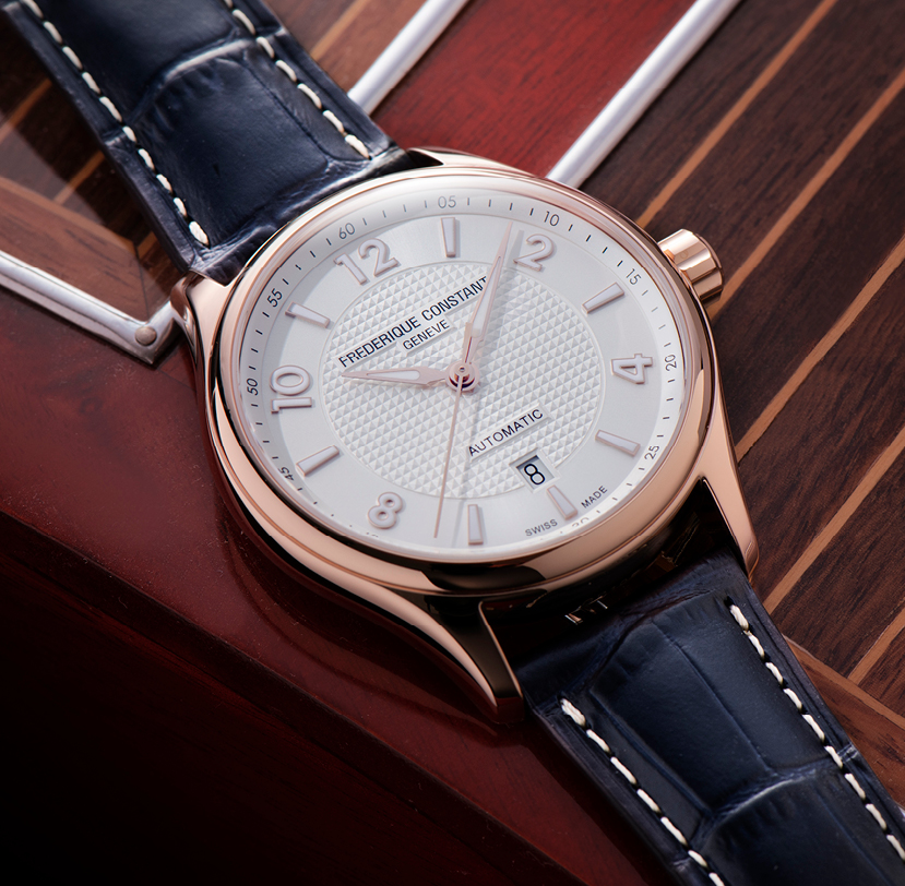 Runabout Automatic watch for man. Automatic movement, silver dial with clous de Paris guilloché in the center, rose-gold plated case and blue leather strap 