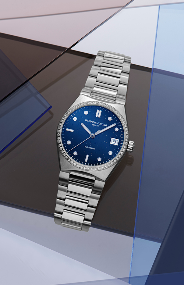Highlife Ladies Automatic Sparkling watch for woman.   Automatic movement, blue dial with 8 diamonds, stainless-steel case with 60 diamonds, date window and stainless-steel integrated and interchangeable bracelet 