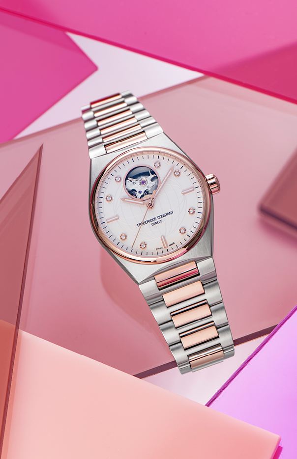 Highlife Ladies Automatic watch for woman. Automatic movement, white dial with 8 diamonds, stainless-steel and rose-gold plated bicolor case, heart beat opening and stainless-steel and rose-gold plated bicolor integrated and interchangeable bracelet 