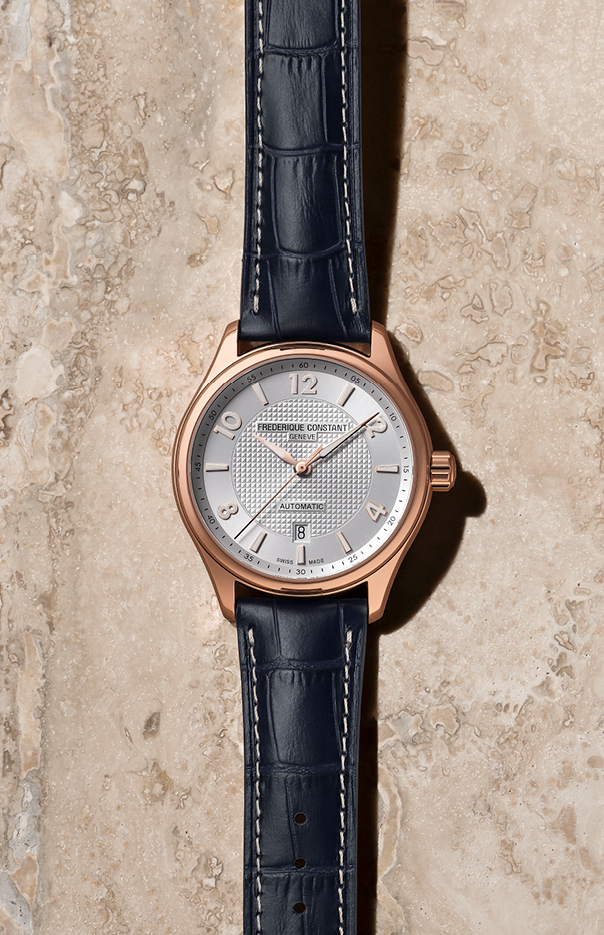 Runabout Automatic watch for man. Automatic movement, silver dial with clous de Paris guilloché in the center, rose-gold plated case and blue leather strap 