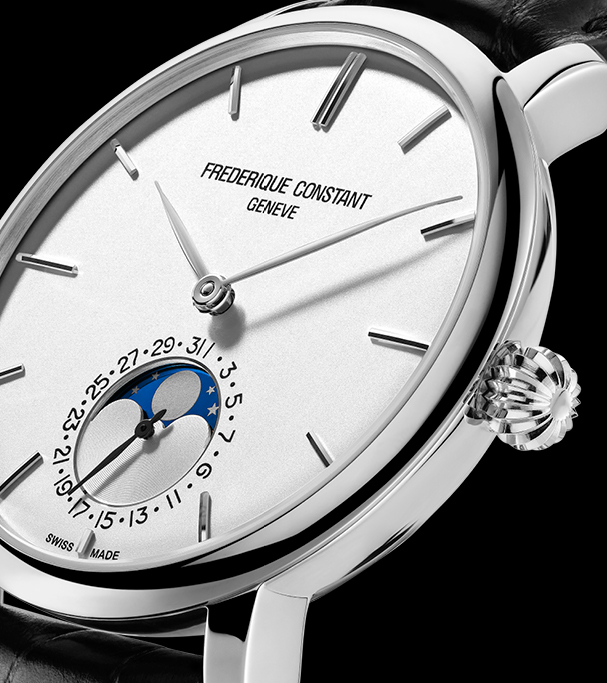 Constant Slimline Moonphase Manufacture watch for man.   Automatic movement, white dial, stainless-steel case, date counter, moonphase and black leather strap 