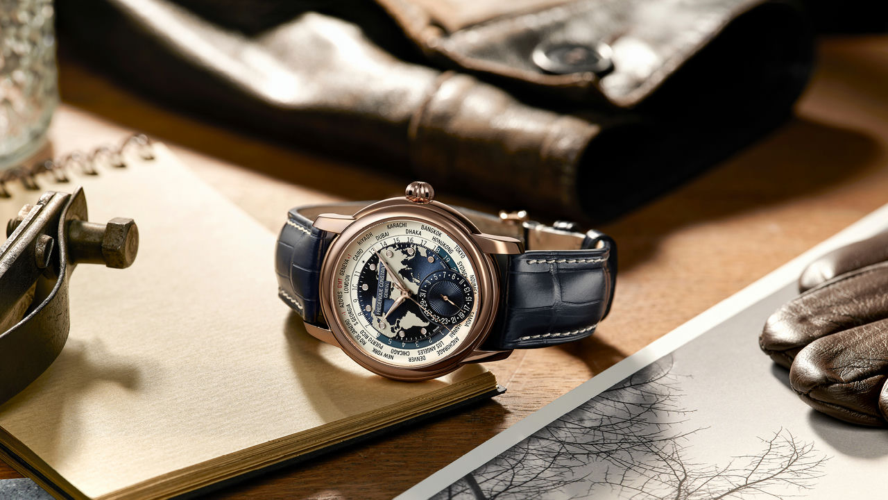 Classicss Worldtimer Manufacture watch for man. Automatic movement, grey and blue dial, 18K rose-gold case, date counter, worldtimer and blue leather strap. Limited Edition watch