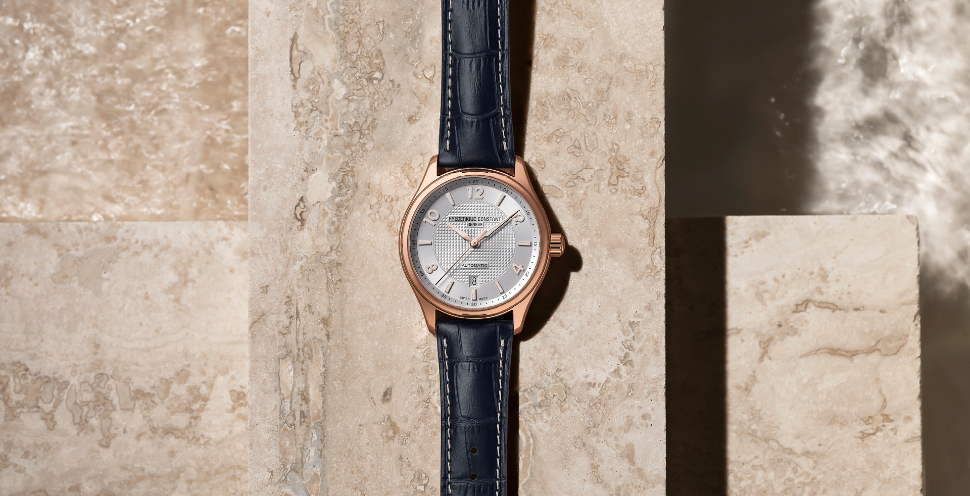 Runabout Automatic watch for man. Automatic movement, silver dial with clous de Paris guilloché in the center, rose-gold plated case and blue leather strap 