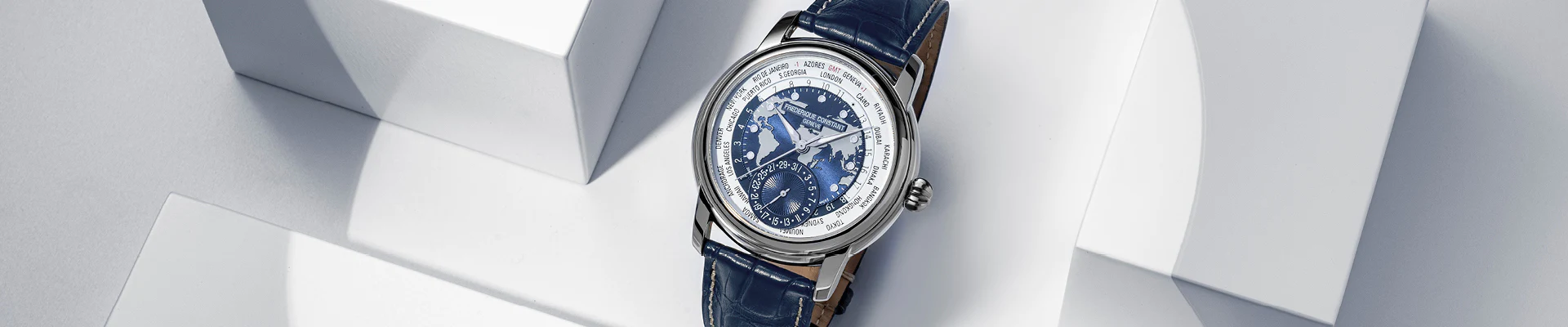Worldtimer Manufacture watch for man. Automatic movement, grey and blue dial, stainless-steel case, date counter, worldtimer and blue leather strap 