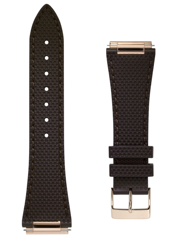 Brown rubber strap. Easy changing system strap. Stainless-steel tongue buckle. Width: 14x12mm. Interhorn: 14mm. Length 115x75mm