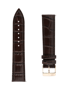 Dark brown calf leather strap with beige lining and dark brown stitching. Yellow gold plated tongue buckle. Width: 20x18mm. Interhorn: 20mm. Length 120x80mm